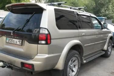 Дефлекторы окон (ветровики) Mitsubishi Pajero Sport 1998-2007/Challenger 1999-2008 (Митсубиши Паджеро) Кобра Тюнинг